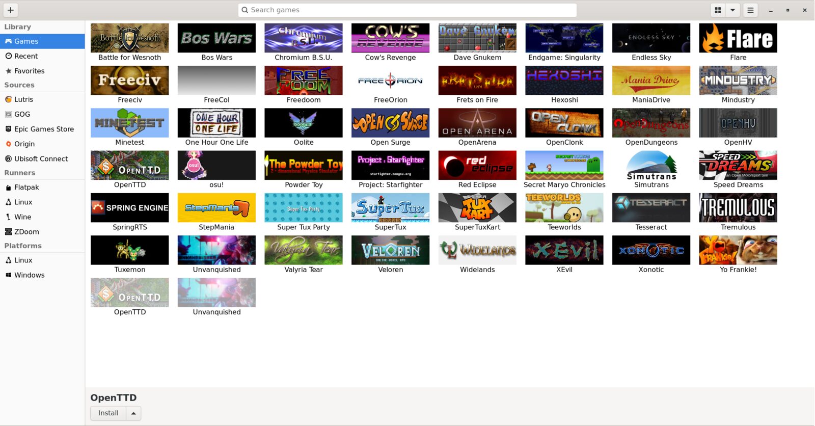 La bibliothèque de Lutris: une grille de jaquettes de jeux libres, et une barre latérale avec les sources, les runners Wine et Linux, et les plateformes